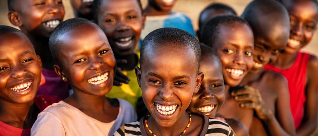 Children of Bogetenga Children's Home in Kisii, Kenya smiling together